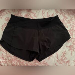 black lululemon low rise shorts